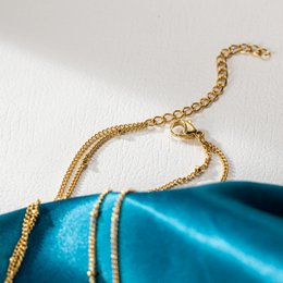 Gold World Map Pendant Necklace