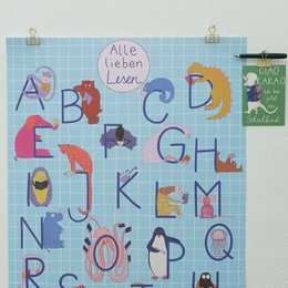 Colorful alphabet poster with various illustrated letters and objects. Suitable for children's room or educational setting.