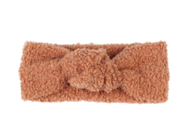 Soft, plush brown teddy bear headband for kids. Cozy and comfortable accessory for cold weather.