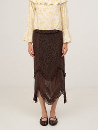  Chocolat brown lace skirt with floral print blouse, featuring a long, flowing silhouette and delicate lace detailing.