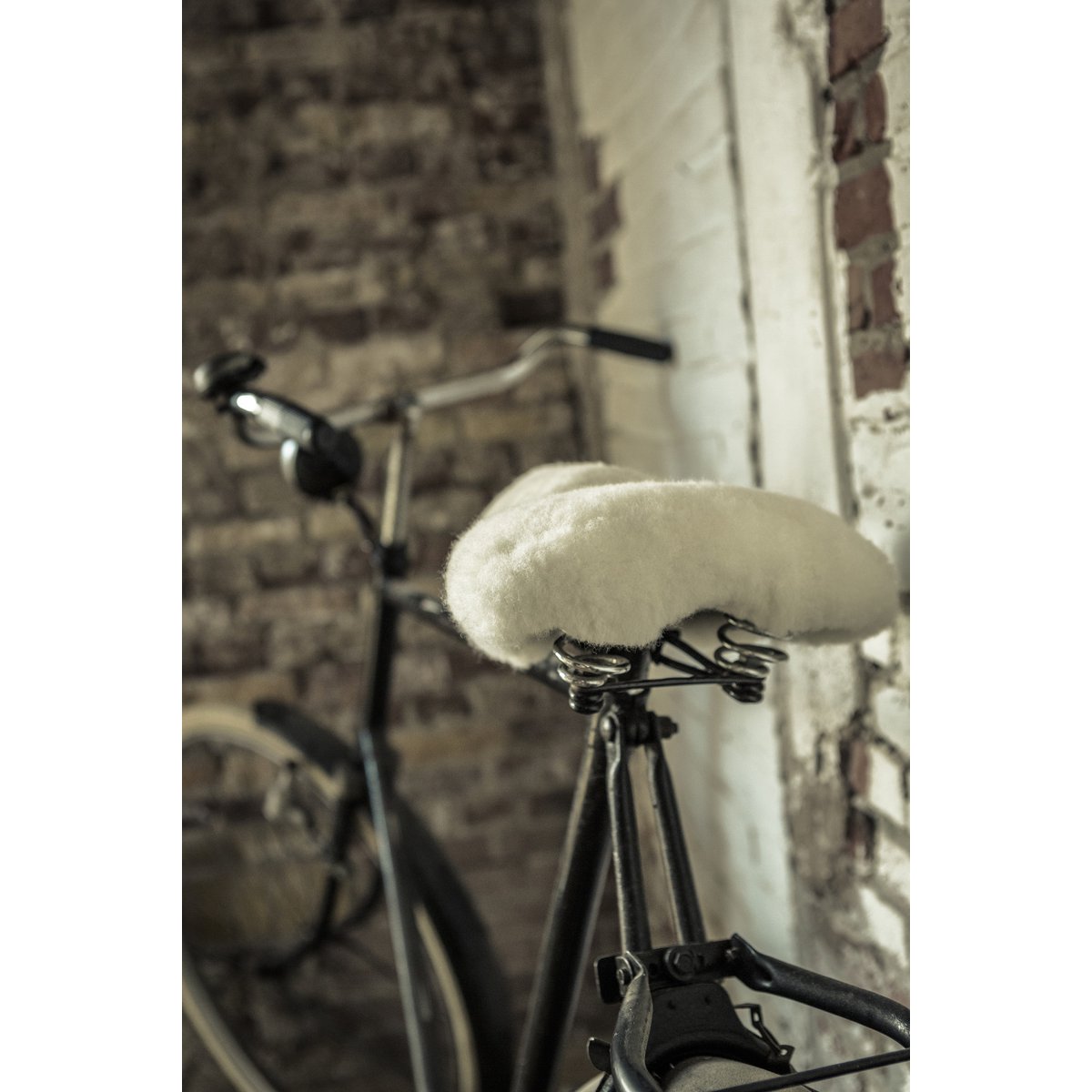Coprisella per bicicletta in pelle di pecora | 4 colori