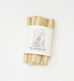 Palo Santo incense sticks, natural wood, earthy aroma, spiritual cleansing, minimalist packaging design.