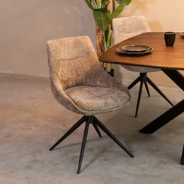 Beige chenille dining chair, modern swivel base, black metal frame, comfortable upholstered seat, contemporary design.