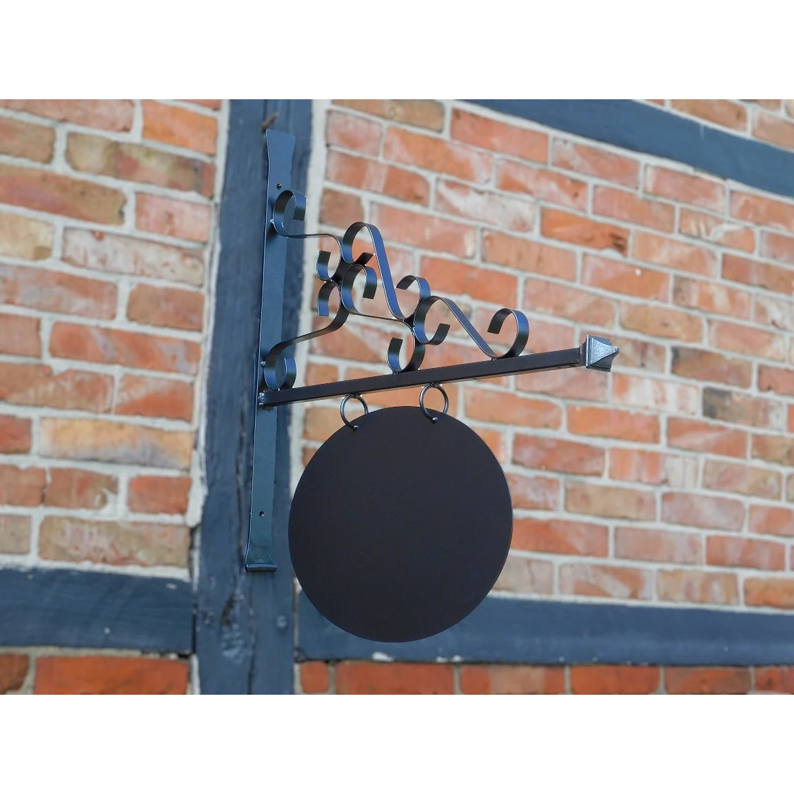 Iron shop sign – black powder-coated – romantic – oval wall-mounted model