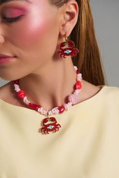 Crab Crimson – Handgemaakte krab- en boze oogketting