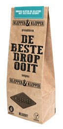 Mild salty licorice in a paper bag with the text "De beste drop" (The best licorice) and the brand name "Klippies & Klapper".