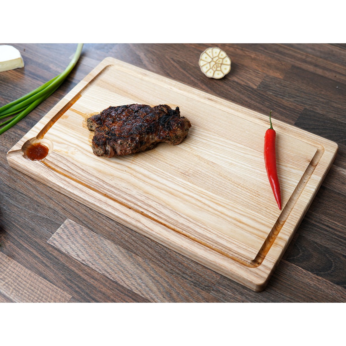 Tabla de cortar de madera de fresno con ranura para jugo