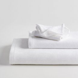  White cotton hammam terry bath towel set, soft textured fabric, rolled and folded towels