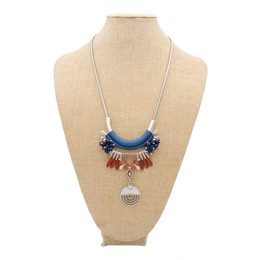 CHARALÁ blauwe en cooper statement ketting