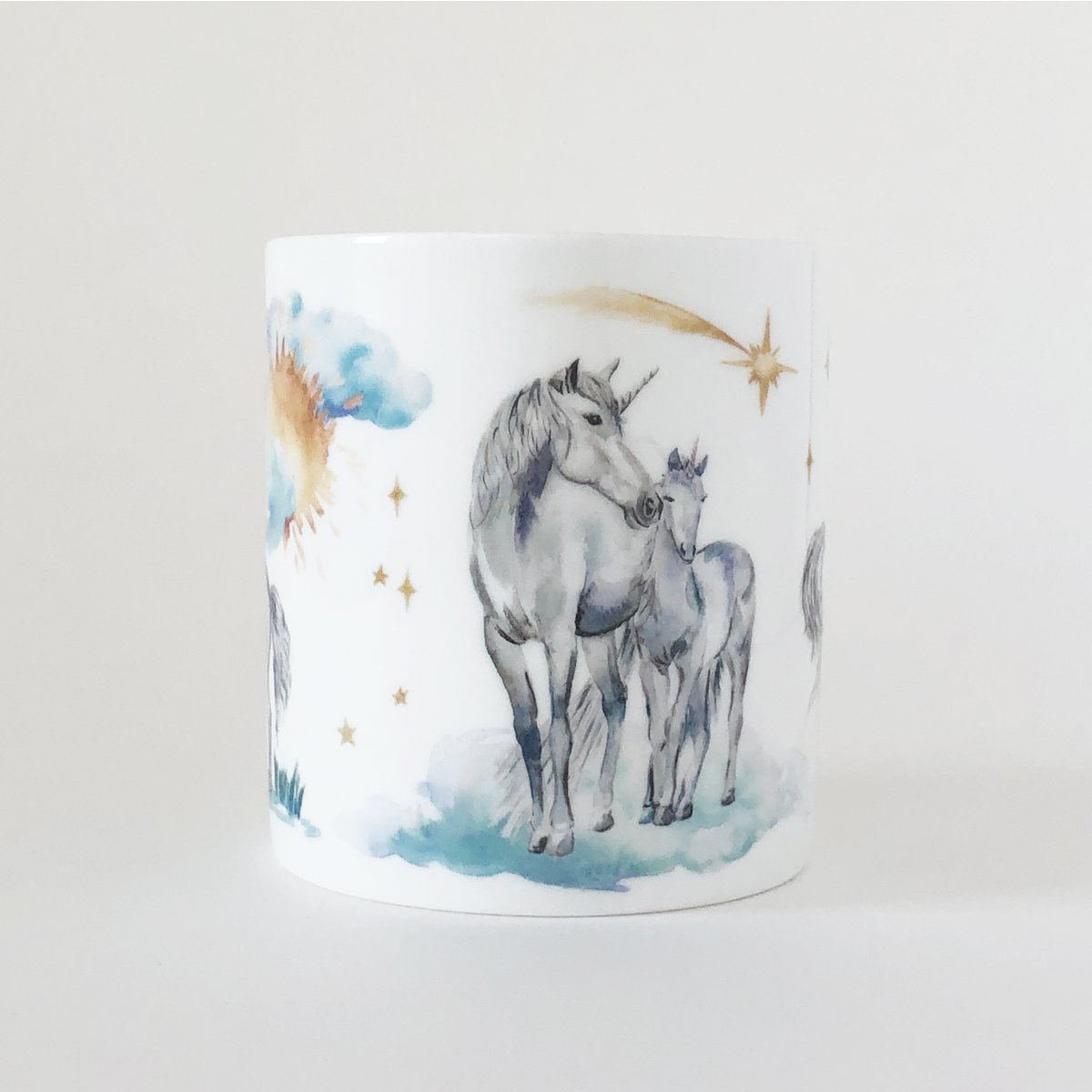 Aquarel eenhoorns en regenbogen mok