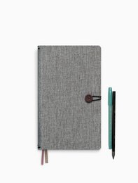 Linen notebook with moss agate button closure, suitable for everyday use and note-taking.