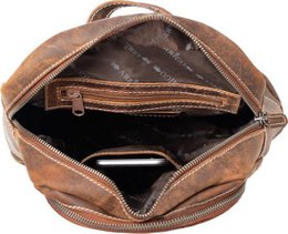 Stylish backpack of natural cognac buffalo leather - robust and versatile backpack, perfect for both daily use and adventurous outings.