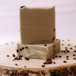 Riesling hand and body soap, a natural soap bar made with riesling wine and coffee beans, providing a luxurious cleansing experience.