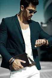 K0027AB | Wrist Pouch in Canvas/Genuine Full Grain Volanata Leather - Color Black/Dark Brown - Polished Nickel Accessories. Dimensions: 25.5 x 17.5 x 1 cm - Packaging: Tnt bag