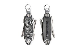 Compact key organizer with multiple tools including a bottle opener, screwdriver, and wrench. Made of durable stainless steel with a sleek, modern design.