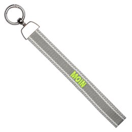  Beige woven keychain with pink "Bonjour" text, metal ring attachment, French-inspired bag charm accessory.
