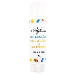 Lip care product with natural ingredients including shea butter, vegetable oils, and vitamin E. Provides moisturizing and nourishing care for the lips.