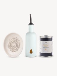 Mist grey oil and vinegar set with minimalist design, cream ceramic bowl, white bottle, dark container, modern kitchen essentials.