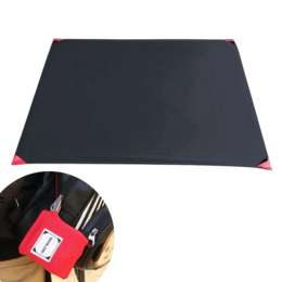 Outdoor camping pocket mat, dark gray trapezoid shape, red compact pouch, portable with sardines included.