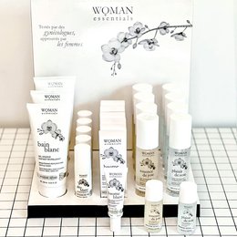 A set of intimate care products featuring a whitening starter set. The products include various tubes and bottles in a clean, minimalist design with a floral motif.