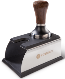 Tamper station for the portafilter - pressure station