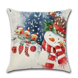 Cushion cover featuring a festive snowman design with birds, holly, and Christmas ornaments. Made of soft, high-quality material.