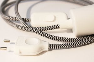 Textile cable for portable lamp