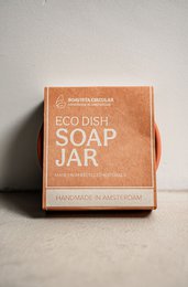 Eco dish soap jar made of natural ingredients in a square glass container.