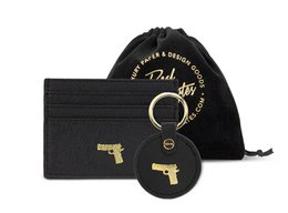 Black card case and keychain set with gold-tone gun charm detail. Compact, minimalist design with multiple card slots for convenient storage.