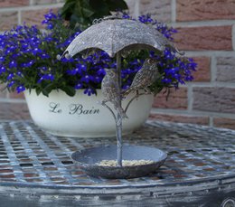 Bird bath for hanging made of metal - round