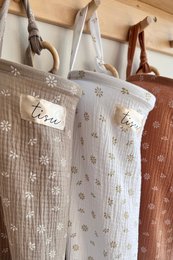 Nursing cover with a matching storage pouch