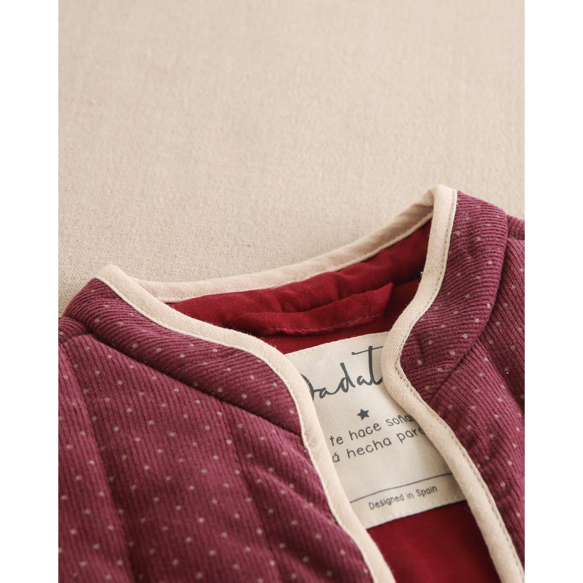 Purple corduroy vest for girls with beige polka dots P78-11604145