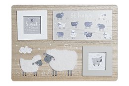 Rustic wooden frame with sheep illustrations and text "Sweet dreams little one"