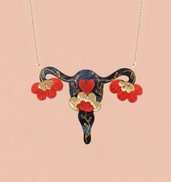  Black and red uterus-shaped necklace with floral accents.