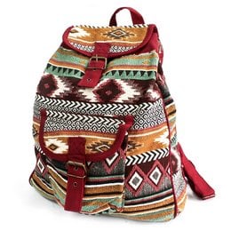 Jacquard backpack with colorful tribal-inspired patterns and designs, featuring a roomy main compartment and adjustable straps for comfortable carrying.