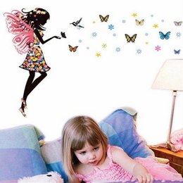 Colorful butterfly fairy wall stickers with a whimsical design, perfect for decorating a girl's room.