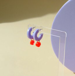 Silva hoop earrings made of acrylic and stainless steel in lilac and neon orange