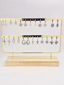 Lot 12 pairs of stainless steel earrings on offered display