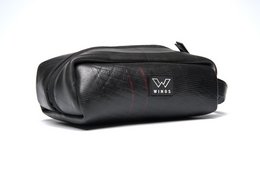 Black leather toiletry bag with zipper closure and Wahl logo.