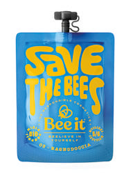 Regenerating shower gel in 50ml size, featuring a bright blue and yellow label with the text "Save the Bees" and a bee graphic, indicating the product's focus on sustainability and environmental protection.