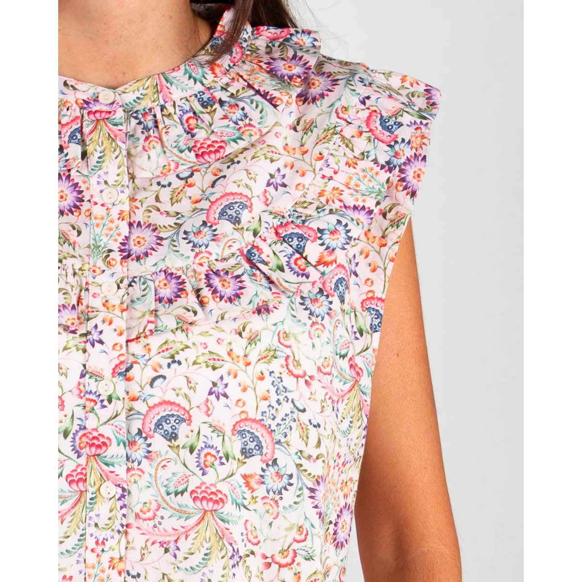 La blouse femme sans manches à volants Febre rose