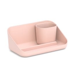 A blush-colored bathroom organizer with a rectangular shape and a compartment for storing bathroom essentials.