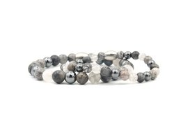 A set of two gray bracelets with the text "MR. & MRS." engraved on them. The bracelets feature a mix of gray and white beads in various shapes and sizes, creating a stylish and elegant look.