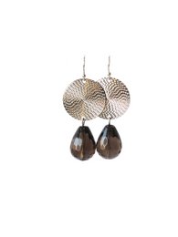 Smoky quartz drop earrings with rhodium-plated metal discs and teardrop-shaped quartz stones.