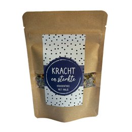  Herbal tea with anise flavor, packaged in a kraft paper bag with a polka dot design label.