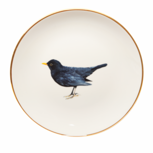plate with blackbird with gold rim