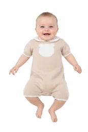 Beige knit baby romper with white bear pocket, short sleeves, newborn one-piece outfit.
