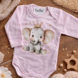 Pink baby bodysuit with cute elephant wearing crown graphic design, long sleeves, newborn clothing.