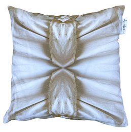 Outdoor pillow with a soft, textured pattern in shades of white and beige. Filled with a comfortable material, suitable for use in outdoor seating areas or as a decorative accent.