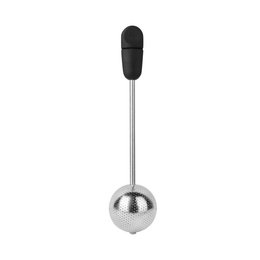 Stainless steel tea strainer with rotating function, ideal for brewing loose leaf tea.